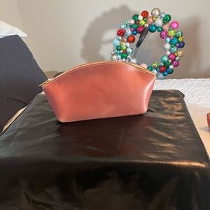 Portland Leather Smooth Leather Full Eclipse Make-up Bag color is Pink firm